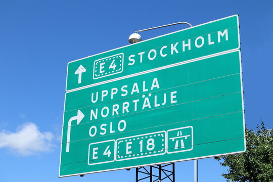 Swedish traffic sign. Road directions to Stockholm, Uppsala, Norrt&auml;lje and Oslo.