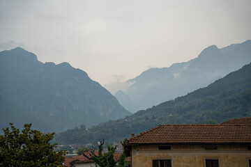 Mandello del Lario, Italy - June 08, 2024: Italian mountains in fog.