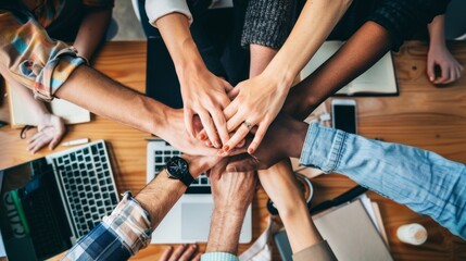 Colleagues in the office are celebrating success with enthusiasm and joy, showcasing teamwork and achievement