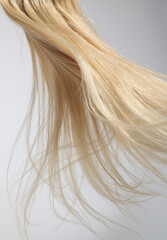 blond hair extension flying 