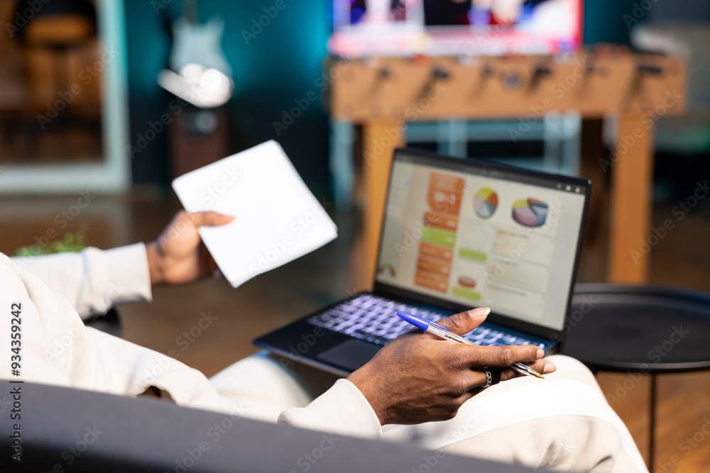 Poster freelancer working from home doing math calculations using statistical data financial graphs. remote