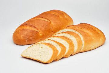 Golden, freshly sliced loaf of homemade bread, perfect for sandwiches, breakfast, or toasting