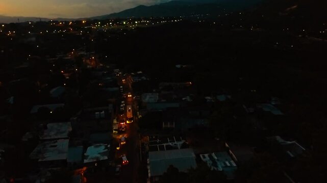 Flying over a ghetto in Jamaica at night 2
