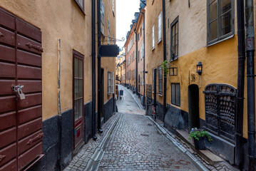 Sweden quaint cobblestone street in picturesque Gamla Stan, Stockholm's oldest neighborhood