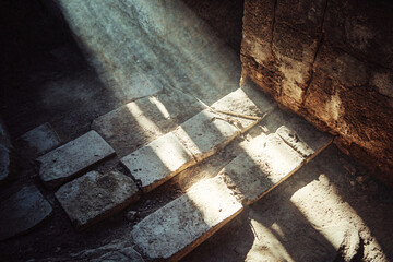 A brick wall with a shadow on it