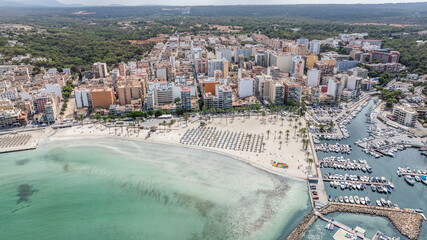 aerial cityscape view of S'Arenal a village located on Mallorca, a Balearic Island, south of Palma de Mallorca with harbor and buildings  © Mario Hagen