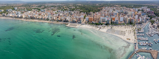 aerial cityscape view of S'Arenal a village located on Mallorca, a Balearic Island, south of Palma de Mallorca with harbor and buildings  © Mario Hagen