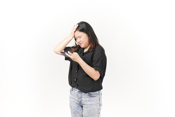 Young Asian woman playing game on smartphone wearing Black t-shirt and jeans isolated on white background