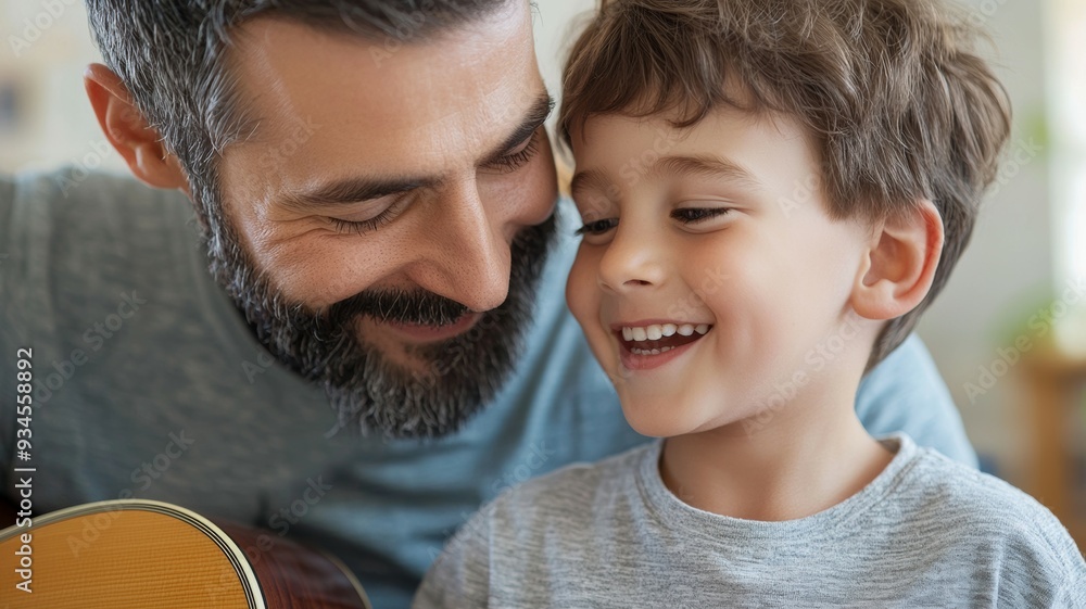 Sticker A man and a boy are sitting together, the man is holding a guitar