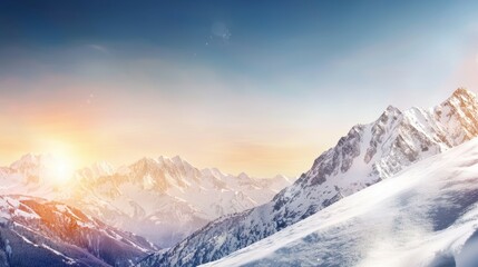 Obraz premium Majestic mountain range with snow-capped peaks and clear blue sky above. Majestic Mountain Range