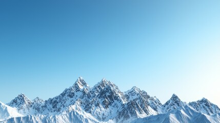 Obraz premium Majestic mountain range with snow-capped peaks and clear blue sky above. Majestic Mountain Range