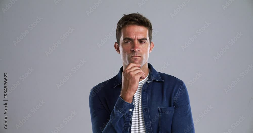 Poster face, smile and idea with a young man in studio isolated on gray background to relax while feeling p