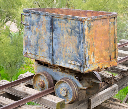 Arizona. Old gold mining ore carrier, detail showing the wheels and rail tracks