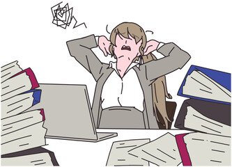 仕事に追われるビジネスウーマン