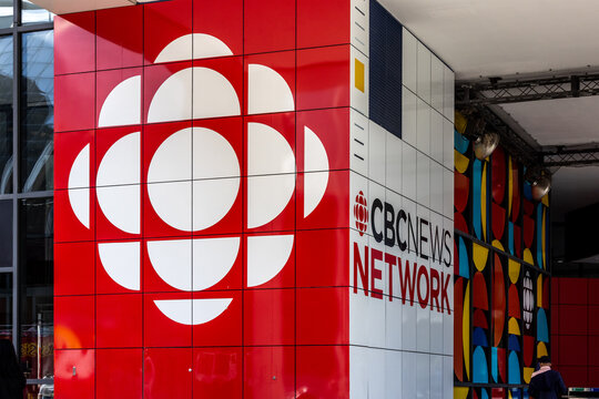 Toronto Canada, August 22, 2024; The big bright red CBC Canadian Broadcasting Corporation News Network sign at the CBC building in Toronto