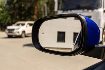 Side mirror of a   car close-up. Exterior detail