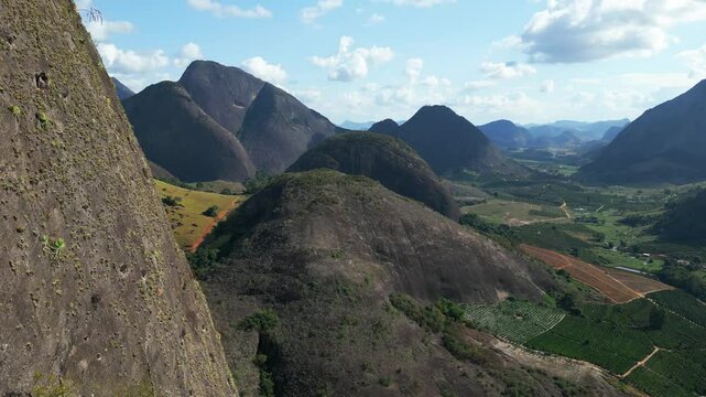Aerial drone footage of a rocky mountain range in the rural area of Aguia Branca, Espirito Santo, Brazil