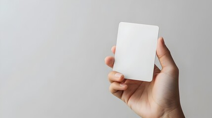 Blank Credit Card Mockup on Woman's Hand Holding Skincare Product Packaging on White Background