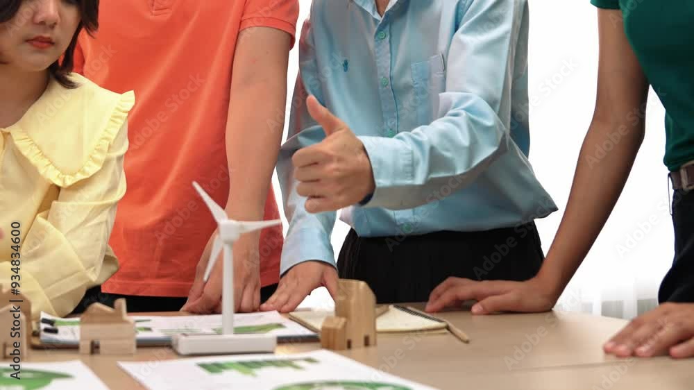 Poster manager recommend alternative energy to team for company's esg. windmill model represented using cle