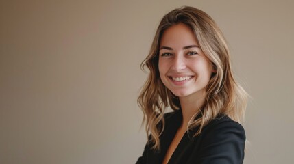 Positive, corporate woman with a captivating smile, isolated on a minimalist beige background, exuding professionalism.