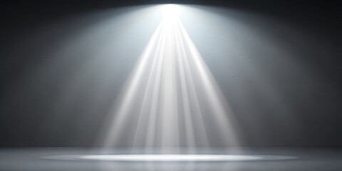 A beam of light shining down on a light gray background, creating an empty space for product display or presentation