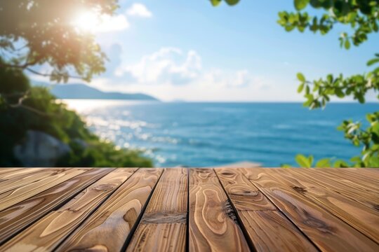 Wooden Plank Tabletop Overlooking a Blurred Ocean and Coastal Trees