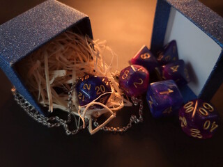 Dice for one of the most popular tabletop role-playing games. Atmospheric photo.