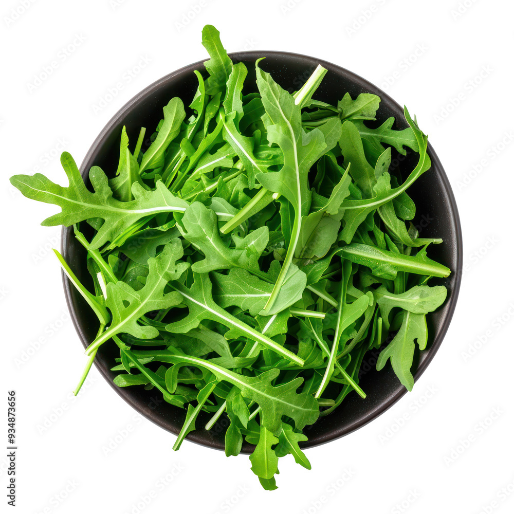 Wall mural arugula lettuce in a bowl top view isolate on transparency background