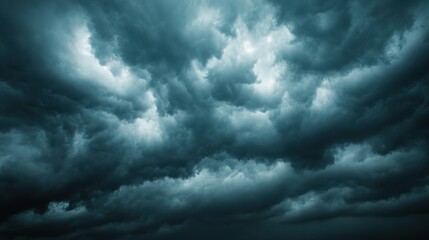 Obraz premium Dark, stormy clouds gathering during a rainy season, capturing the dramatic and intense weather