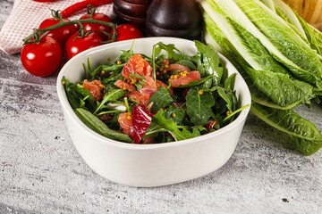 Salad with salmon and arugula