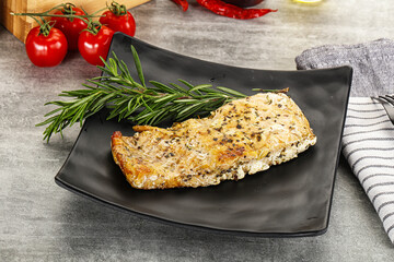 Baked salmon fish served rosemary