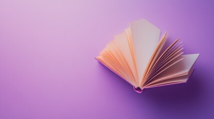 Open Book on Purple Background