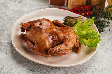 Baked small chicken with spices