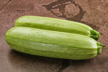 Raw green ripe zucchini vegetable