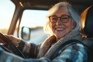 A woman in a car with a smile on her face