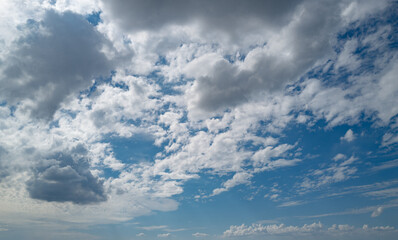 Cloud on blue sky. Pastel soft fluffy clouds with empty space. Beauty placement present promotion, summer paradise dreamy concept. Real sky background with gentle clouds. Poster with Clouds.