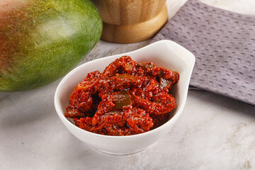 Spicy pickled raw green mango