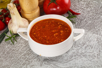 Hot tomato soup with diced chicken