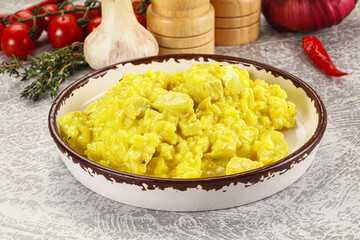 Italian cuisine - yellow risotto with chicken