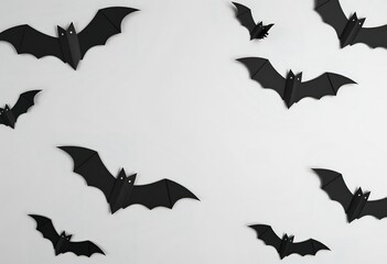 Fototapeta premium Halloween concept. black paper bats on grey background