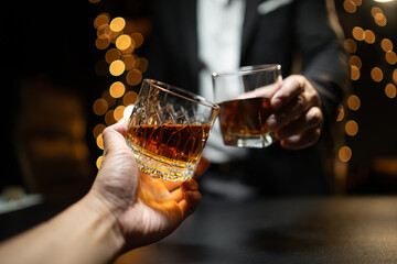 Celebrate whiskey on a friendly party in  restaurant.