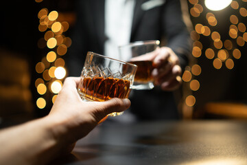 Celebrate whiskey on a friendly party in  restaurant.
