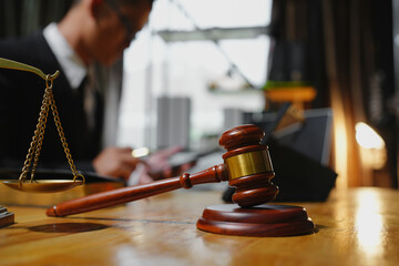 Male lawyer sitting and working, solving problems and work related to the legal work of lawyers.