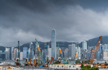 Construction site in Hong Kong , with modern skylines in the background