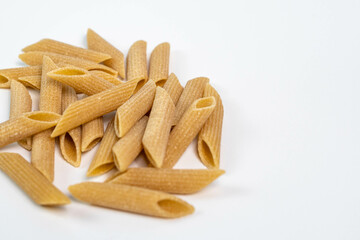 Closeup of Penne Pasta on White Background