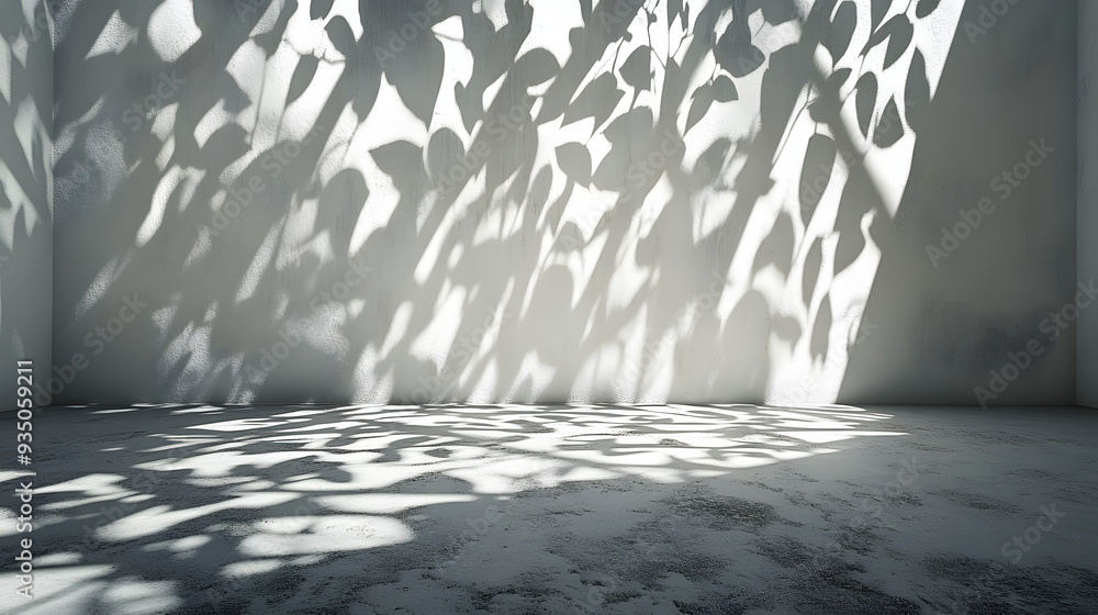 Poster a room with white walls and floor is lit by light casting leaf patterns, creating dark shadows and b
