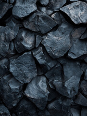 Black decorative dry stones, beautiful texture saturated, top view, black background, dark vibe, matte stones