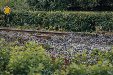 Renovating a railroad track. Workers removed tracks, sleepers and first layer of gravel ballast....