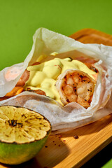 A minimalist food photography of healthy seafood dish. Various seafood, including salmon and shrimp