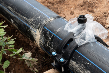 Pipe of High-Density Polyethylene. Water pipe connector for export. Water pipes buried underground.